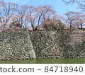 Sakura, blue sky and stone wall 84718940
