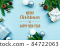 Christmas present and pine tree with xmas decoration on blue background 84722063
