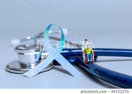 Man sitting on wheelchair and doctor with ribbons , World cancer day concept 84722270