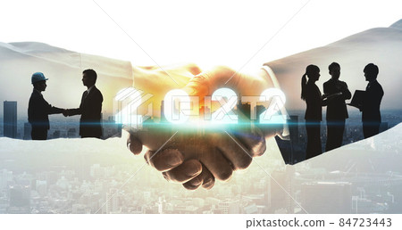 People shaking hands 2022 image New Year's card material for business People shaking hands 2022 image New Year's card material for business 84723443