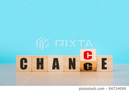 Wooden cube block flipping for "change" to "chance" wording, success on blue background, strategy, solution, business and Positive thinking concepts 84724099