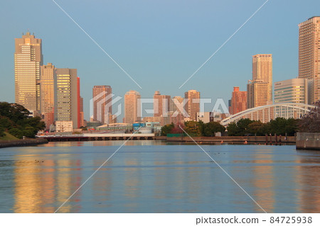 Waterside cityscape Waters bamboo turf and dock evening view 84725938