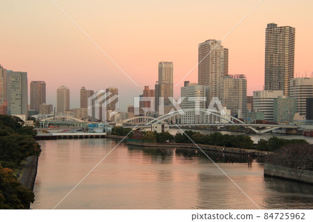 Waterside cityscape Waters bamboo turf and dock evening view 84725962