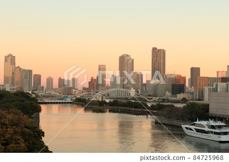 Waterside cityscape Waters bamboo turf and dock evening view 84725968