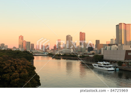 Waterside cityscape Waters bamboo turf and dock evening view 84725969