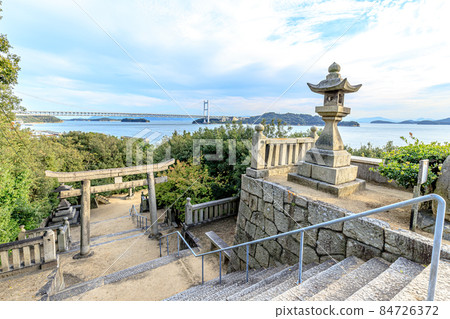 Shimotsui Gion Shrine and Setoo Bridge at dusk, Kurashiki City, Okayama Prefecture 84726372