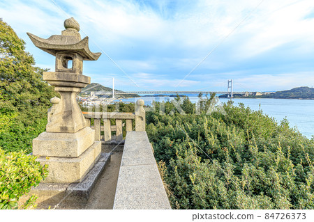 Shimotsui Gion Shrine and Setoo Bridge at dusk, Kurashiki City, Okayama Prefecture 84726373