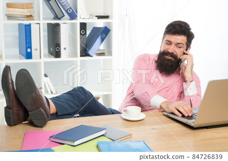 Business communication. Bearded man talk on phone Business communication. Bearded man talk on phone 84726839