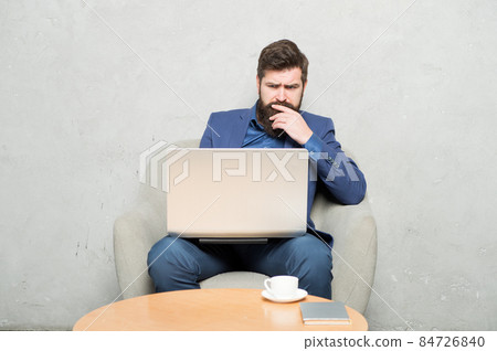 Blogging is a must for any company. Bearded man Blogging is a must for any company. Bearded man 84726840