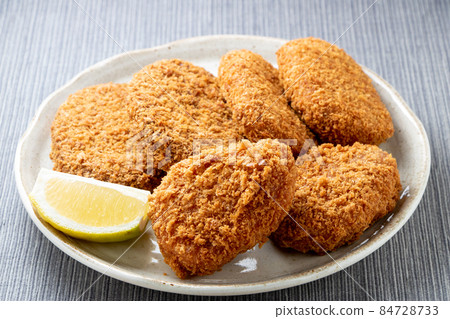 Assorted fried foods. Ebi cutlet in the foreground, minced meat cutlet on the back left, croquette on the back right, 2 each. Assorted fried foods. Ebi cutlet in the foreground, minced meat cutlet on the back left, croquette on the back right, 2 each. 84728733