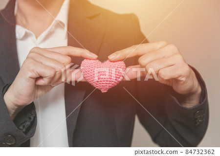 Business employee with heart for customer care relationship management and service mind concept 84732362