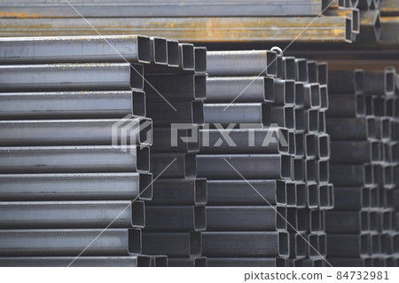 Metal profile pipe of rectangular cross section in packs at the warehouse of metal products Metal profile pipe of rectangular cross section in packs at the warehouse of metal products 84732981