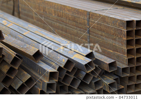 Metal profile pipe of rectangular cross section in packs at the warehouse of metal products Metal profile pipe of rectangular cross section in packs at the warehouse of metal products 84733011