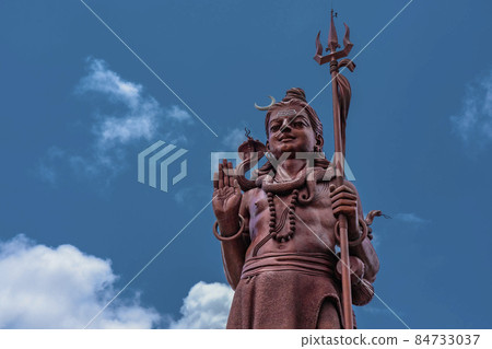 Shiva statue at Grand Bassin temple, the world's tallest Shiva temple, it is 33 meters tall. Important hindu temples of Mauritius. Shiva statue at Grand Bassin temple, the world's tallest Shiva temple, it is 33 meters tall. Important hindu temples of Mauritius. 84733037