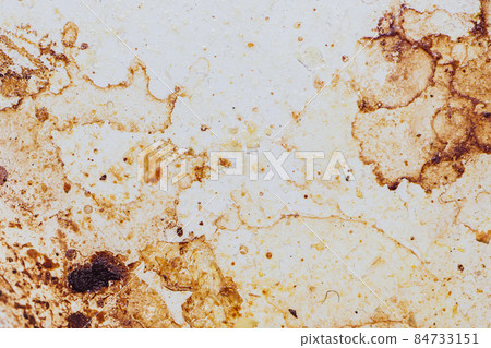 Texture of dirty stains and grease on white stove. Spots of fat on a white background Texture of dirty stains and grease on white stove. Spots of fat on a white background 84733151