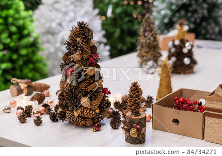 Christmas decorations in the Christmas tree shop. Christmas decorations in the Christmas tree shop. 84734271