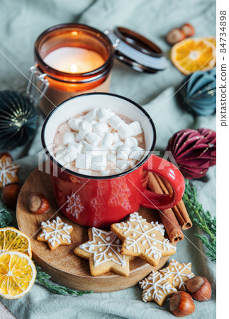 Christmas hot cocoa  in the red cup 84734898