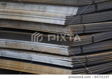 Sheet metal is in bundles in the warehouse 84735297