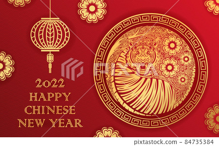 Chinese new year 2022, year of the tiger banner with gold tiger zodiac and gold flower and asian elements paper cut with craft style. 84735384