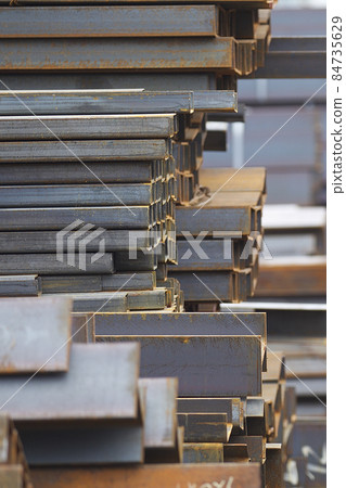 Metal profiles of different kinds are located in the metal products warehouse Metal profiles of different kinds are located in the metal products warehouse 84735629