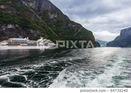 Cruise ship in Geiranger fjord, Norway Cruise ship in Geiranger fjord, Norway 84738240