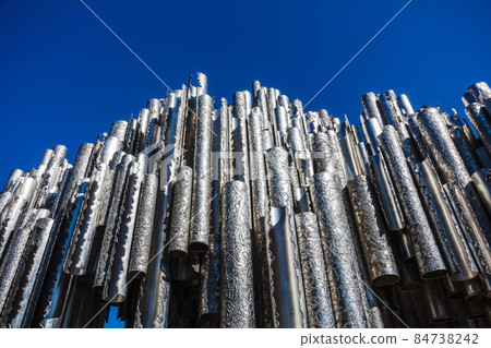 steel pipes against blue sky 84738242