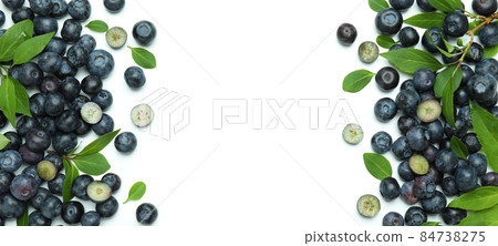 Fresh blueberry with leaves on white background Fresh blueberry with leaves on white background 84738275