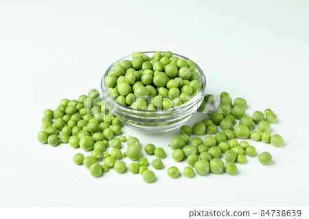Bowl with pea seeds on white background 84738639