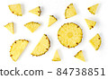 Pineapple pieces isolated on white, from above 84738851