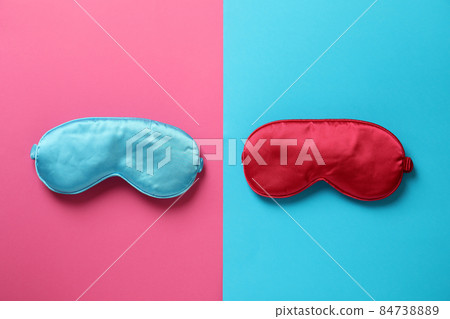 Two sleep masks on two tone background Two sleep masks on two tone background 84738889