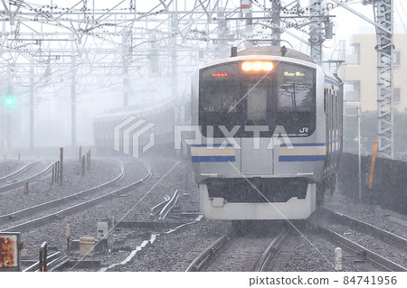 Sobu Rapid Line running in heavy rain Sobu Rapid Line running in heavy rain 84741956