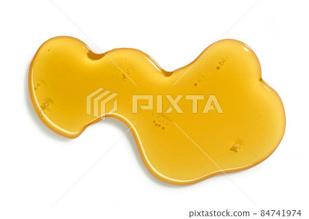 flowing honey on white background flowing honey on white background 84741974