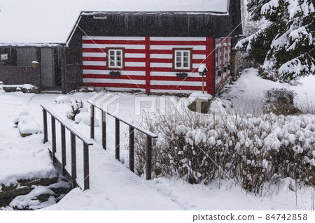 Old wooden log cottages, Orlicke Mountains, Eastern Bohemia, Czech Republic 84742858