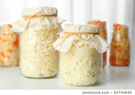 Flat lay composition with graphic drawing tablet and different office items on grey stone background 84744646