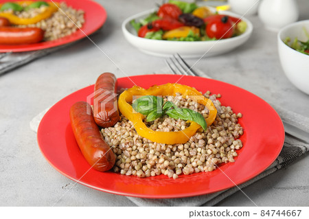 Flat lay composition with graphic drawing tablet and different office items on grey stone background 84744667