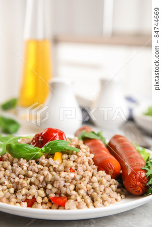 Flat lay composition with graphic drawing tablet and different office items on grey stone background 84744669