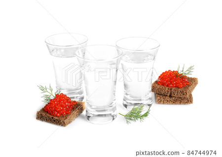 Russian vodka and red caviar sandwiches isolated on white Russian vodka and red caviar sandwiches isolated on white 84744974
