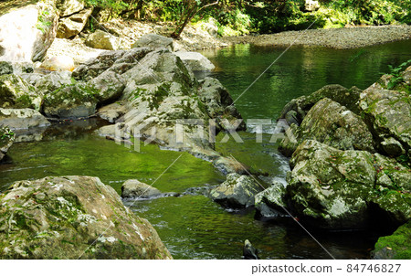 Mountain stream downstream of Materia Falls in Yamato Village, Amami 84746827