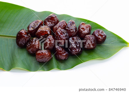 Sweet chinese jujube dessert on green leaves 84746940