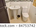 sanitary ware or toilet of a resort or hotel bathroom, white room and no one in the picture. 84753742