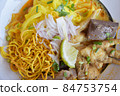 Khao Soi in Northern Thai food. Choose focus and blur according to lens character. Close-up picture 84753754