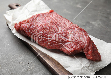 Fresh raw beef cut on grey table, closeup 84757016