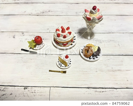 Sweets party with small cakes and fruits 84759062