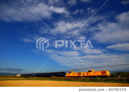 Royal Express running in the autumn sky 84760159