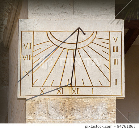 stone sundial close up 84761865
