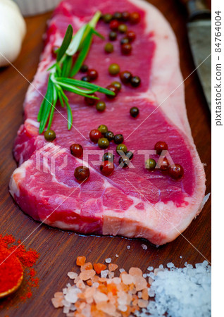 raw uncooked  ribeye beef steak butcher selection 84764004