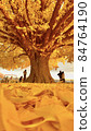 Large ginkgo buried in golden fallen leaves 84764190