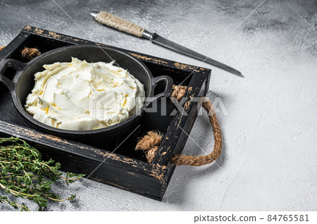 Cream cheese Mascarpone in a wooden tray for tiramisu. White background. Top view. Copy space 84765581