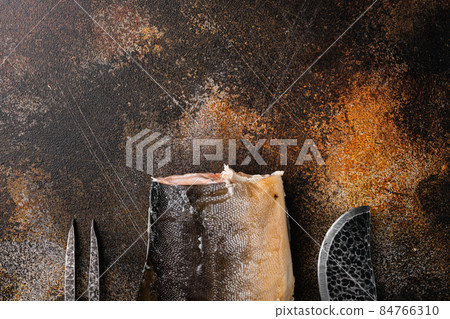 Whole hot smoked fish, on old dark rustic table background, top view flat lay, with copy space for text Whole hot smoked fish, on old dark rustic table background, top view flat lay, with copy space for text 84766310