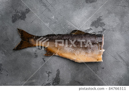 Fresh smoked salmon, on gray stone table background, top view flat lay, with copy space for text Fresh smoked salmon, on gray stone table background, top view flat lay, with copy space for text 84766311